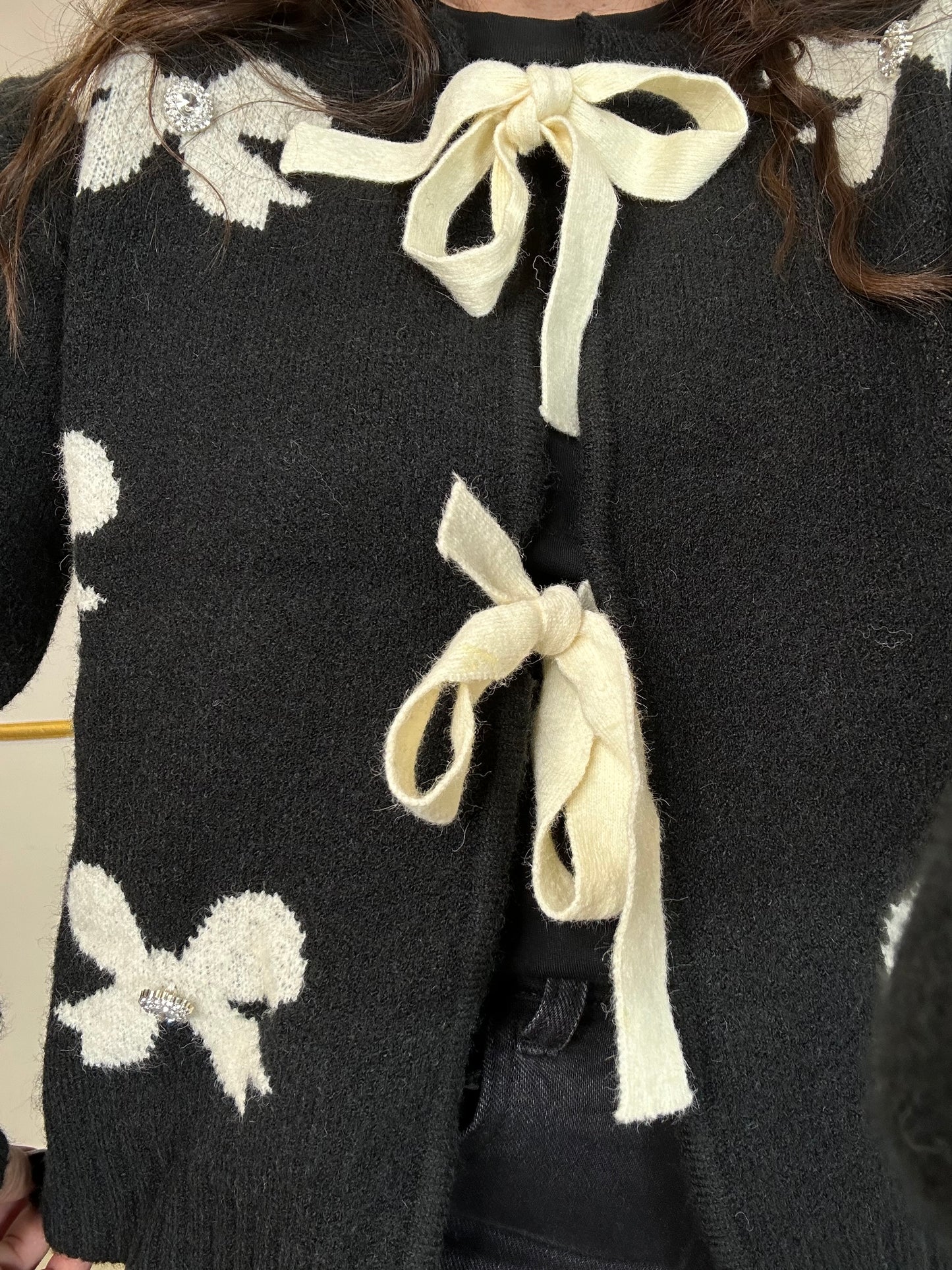MAGLIA CON FIOCCHI