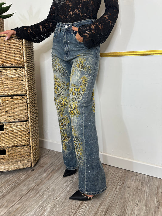 JEANS MACULATO CON STRASS